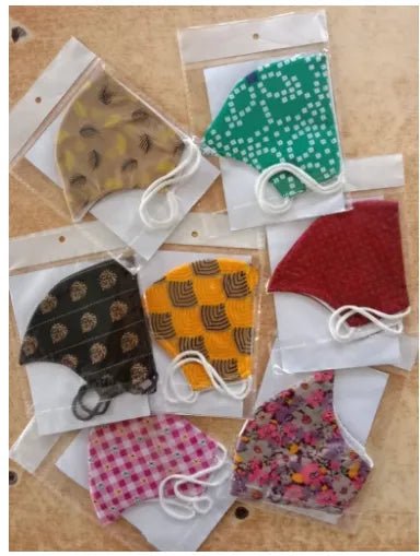 4 - Pack Fashionable Anti - Dust Face Masks for Women, Boys, and Girls (Random Designs) - AlifdukanAlifdukan types here :)