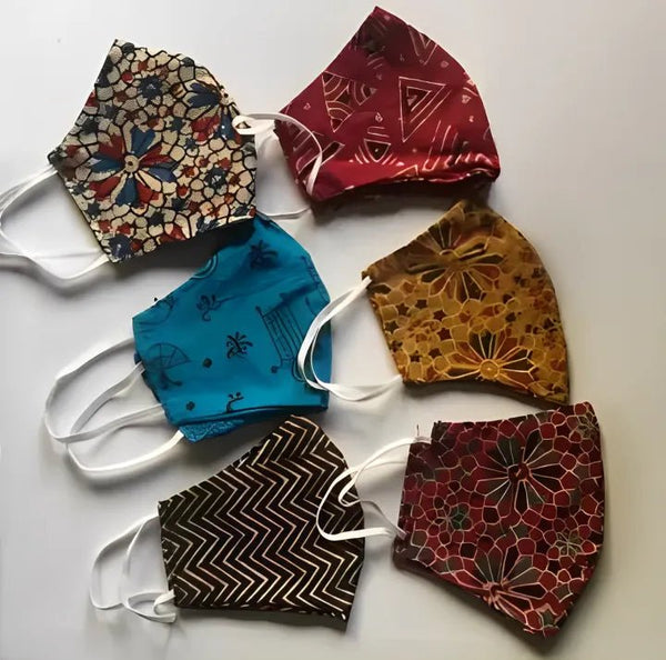 4 - Pack Fashionable Anti - Dust Face Masks for Women, Boys, and Girls (Random Designs) - AlifdukanAlifdukan types here :)