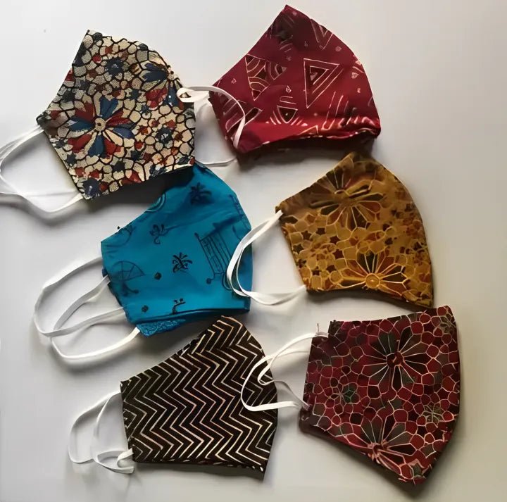 4 - Pack Fashionable Anti - Dust Face Masks for Women, Boys, and Girls (Random Designs) - AlifdukanAlifdukan types here :)