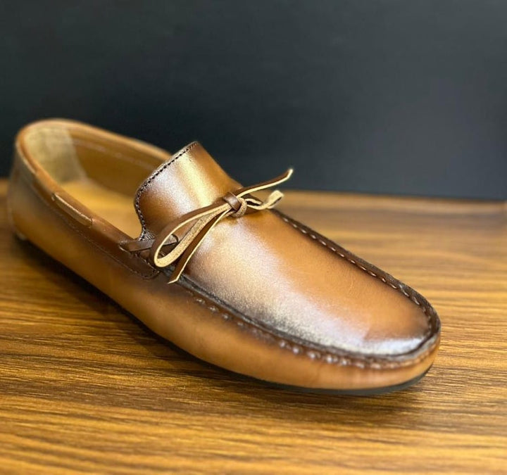 "Elegant Brown Leather Loafers with Bow Detail – Casual Sophistication" - Alifdukanstylebyalif types here :)