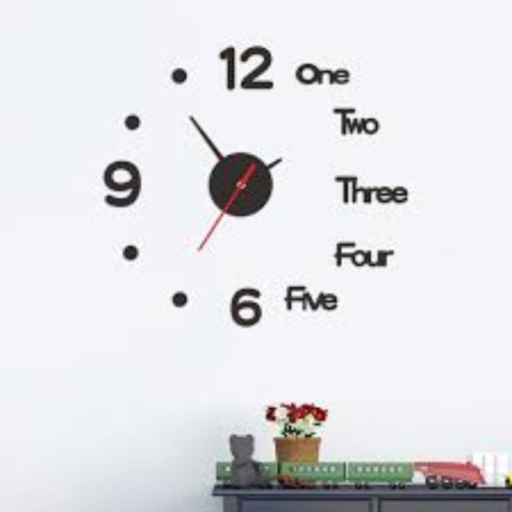 Wall clock with numbers and train decoration on a white wall